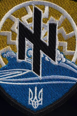 Kiev,Ukraine.Oct 16.Illustrative editorial.Pro-Ukrainian nationaist formation Azow chevron..At October 16,2014 in Kiev, Ukraineのeditorial素材