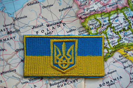 Kiev,Ukraine.JAN 10.Illustrative editorial. Chevron of Ukrainian nationalist formations.With map of Europe.  At January 10,2015 in Kiev, Ukraineのeditorial素材