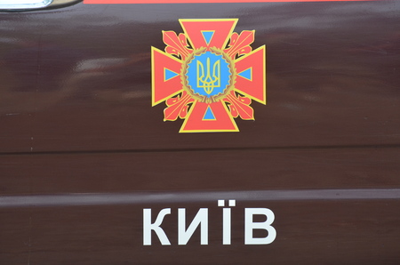 KIEV, UKRAINE - September 03, 2015: Ukrainian rescue and fireman team in the forest. A lot of fire...