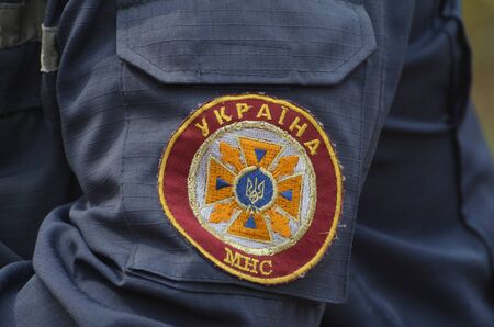 KIEV, UKRAINE - September 03, 2015: Ukrainian rescue and fireman team in the forest. A lot of fire forest near Kiev at beginning of September.のeditorial素材