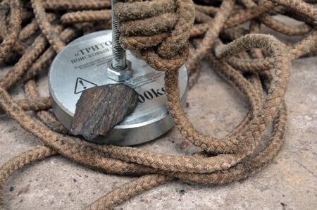 Fragments of iron-silicate meteorite found with search magnet on the river bottom. Ancient meteorite impact place. Kiev, Ukraine.July 11, 2017のeditorial素材