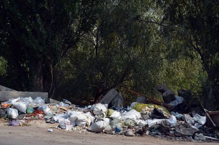 Nature near Ukrainian capital.Environmental contamination. Illegal junk dump. August 24, 2017.Near...