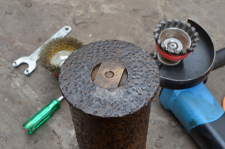Weapon of WWII.Cleanining, deactivating and preparing to war relics collection. Found with metal detector.の写真素材