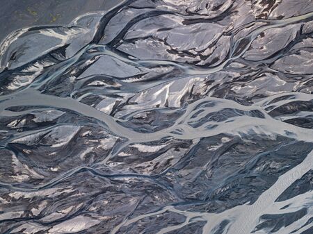 Aerial view of glacier river in Iceland. Beautiful natural backdrop.の素材 [FY310132069550]