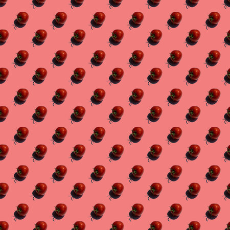 Pattern with many tomatos on red backgroundの写真素材