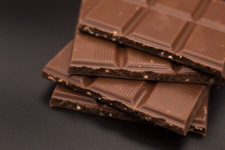 Chocolate slices on a dark backgroundの写真素材