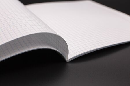 notebook, exercise book, copybook on black background