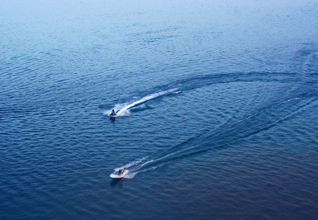 2 motor boats on the lakeの写真素材