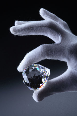 Hand holding the cristalの写真素材