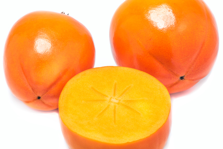 fresh persimmon isolated on white backgroundの写真素材