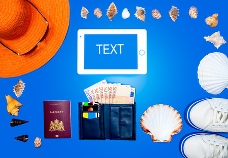 Tourism concept. Explorer equipment on wooden background, top viewの写真素材