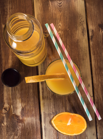 Fresh fruits and glass juice on the tableの写真素材