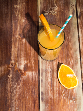 Fresh fruits and glass juice on the tableの写真素材