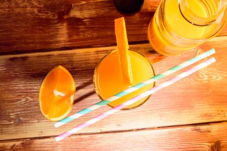 Fresh fruits and glass juice on the tableの写真素材