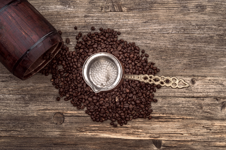 The Turk with hot coffee on an old wooden tableの写真素材