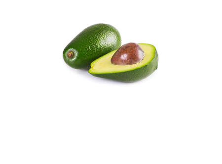 Avocado halves isolated on white background
