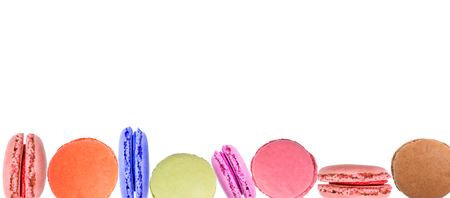 Cake macaron or macaroon on white background from above, colorful almond cookies, top viewの写真素材