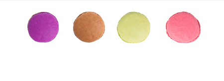Cake macaron or macaroon on white background from above, colorful almond cookies, top viewの写真素材