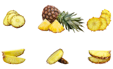 Pineapple and pineapple slicesの写真素材