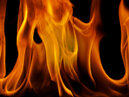 Fire flames on black backgroundの写真素材