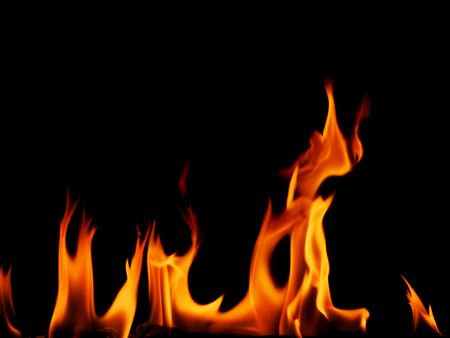 Fire flames on black backgroundの写真素材