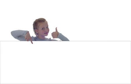 Emotional girl is looking from behindの写真素材