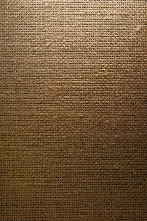 Jute hessian sackcloth canvas woven texture pattern with natural gradienten lightの写真素材