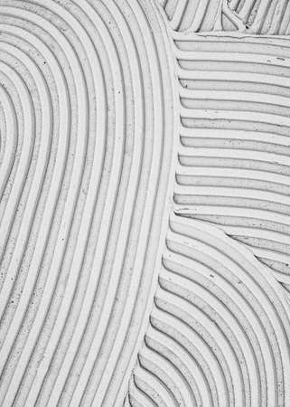 Texture of the Adhesive Mix for laying ceramic tiles. Industry background