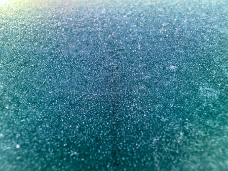 Texture of ice on the window that can be used as a handwritten backgroundの写真素材