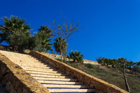 stairs leading to the village located in the mountainsの写真素材