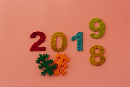 Happy New Year 2019 on a pink backgroundの写真素材