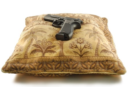 The weapon on east pillow isolated on white background (closeup)の写真素材