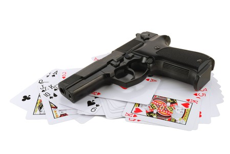 The weapon on playing cards isolated on white backgroundのeditorial素材