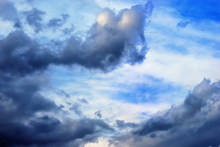 dark clouds on white skyの写真素材