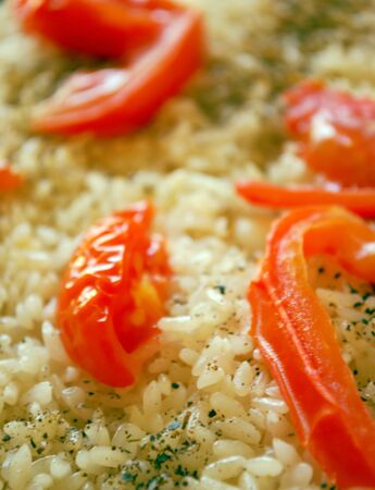 asian vegetarian pillau closeup shot. With tomatoの写真素材