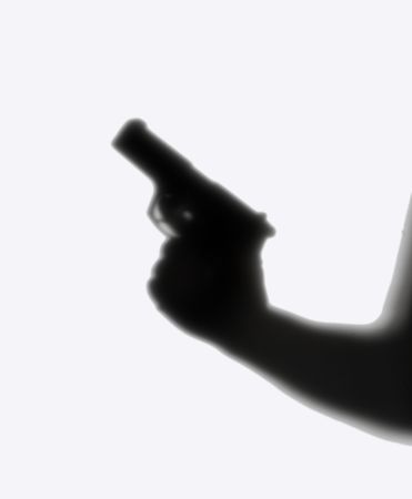 shade of man in a cap and with a pistol on a white background