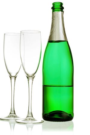 champagne bottle from green glass and wineglasses  on whiteの写真素材