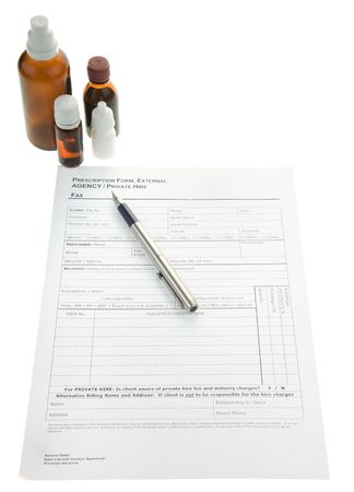 Prescription form, ink pen and medical suppliesの写真素材