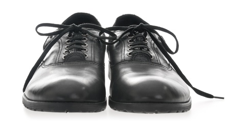 Black Men's leather shoes on a white backgroundの写真素材