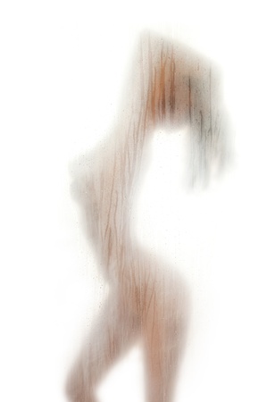 figure of a naked woman behind a transparent curtainの写真素材