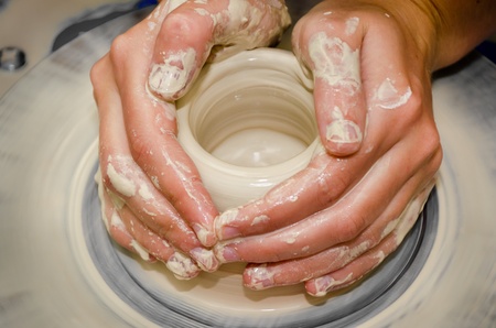 The process of creating pottery by handの写真素材