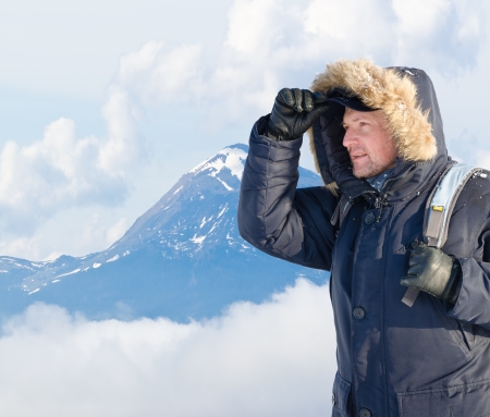 Portrait of a traveler in winter clothes in an outdoor
