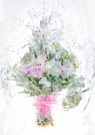 fresh flowers, frozen in a block of iceの写真素材