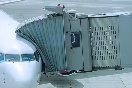 aircraft at the finger in the airportの写真素材