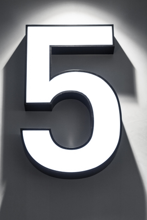 Number 5 Neon sign on the wallの写真素材