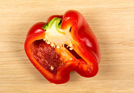 sweet red pepper in a cut on the table