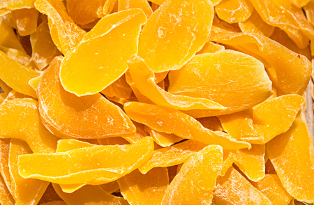 candied ginger slices as a backgroundの写真素材