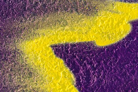 abstract painting on rough concrete surfaceの写真素材