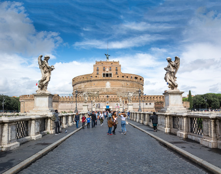 Rome, Italy - Oct 06, 2018: Tourists walking along the bridge of St. Angel, leading to the Castle of the Holy Angel in Romeのeditorial素材