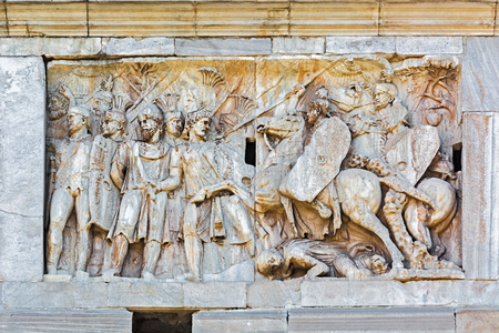 Rome, Italy - Oct 03, 2018: Detail of the triumphal arch of Constantine. Bas-relief on the west side. Episode Dacian Wars.のeditorial素材
